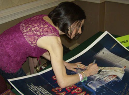 Judy signs an original SLEEPAWAY poster!