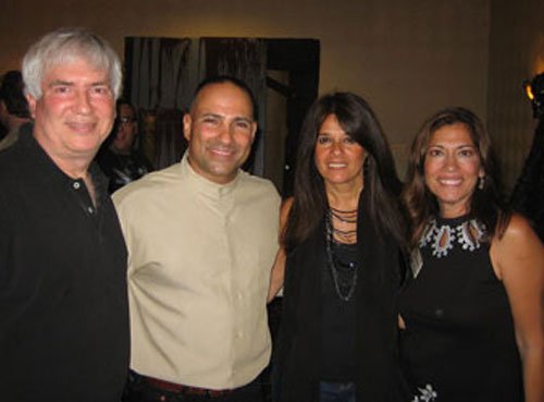 Robert, Frank, Missy, and Angie pose for a snap