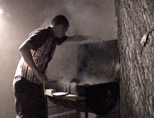 Tim does up some "Dee-Licious" grub for everyone at the pre-screening B-B-Que.