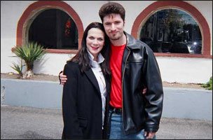 Desiree Gould and Jeff Hayes posing outside after filming Under Surveillance
