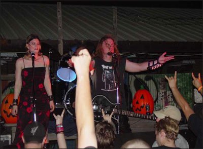 Chester Moore and Ravenica Rose performing at the FREAK13 CD release show