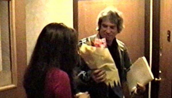 Robert presents his "Angel" some beautiful flowers!