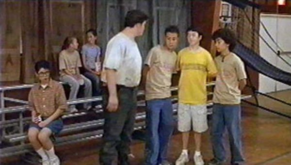 It seems that when Alan isn't being bullied around, he's doing the bullying himself! Being BIG for his age seems to work for him, as his large presence often scares the younger campers (and even some of the older ones). Here he picks on a group of the younger campers while innocent bystander Pee-Pee sits on the bleachers eating a candy bar! Many of you SLEEPAWAY CAMP fans will notice a striking similarity about the way Pee-Pee is sitting. Perhaps something reminiscent of a previous SLEEPAWAY CAMP. Hmmm.