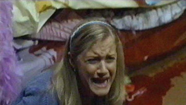 And it just wouldn't be SLEEPAWAY CAMP without all hell breaking loose! Here KAREN finds the bloody corpse of a fellow camper and screams in bloody terror!