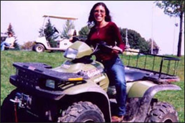Felissa goes for a fun ride on Ken Kelsch's fabulous 4-wheeler!