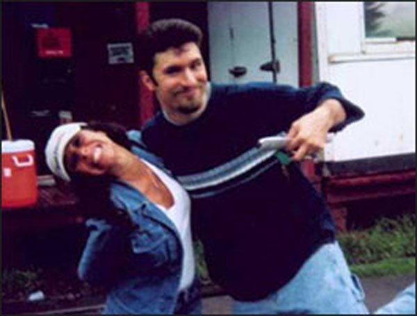 Felissa and Jeff goofing around behind the camp kitchen.