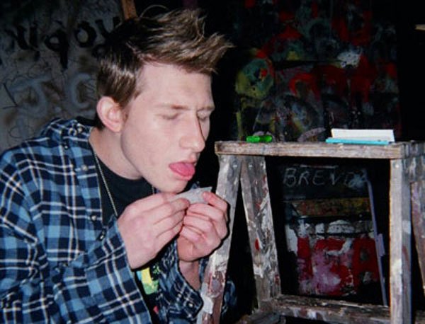 Weed (Adam Wylie) putting together a joint