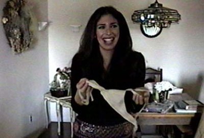 Felissa Rose poses with the actual bra she wore while filming SLEEPAWAY to keep her breasts "flat as a board."