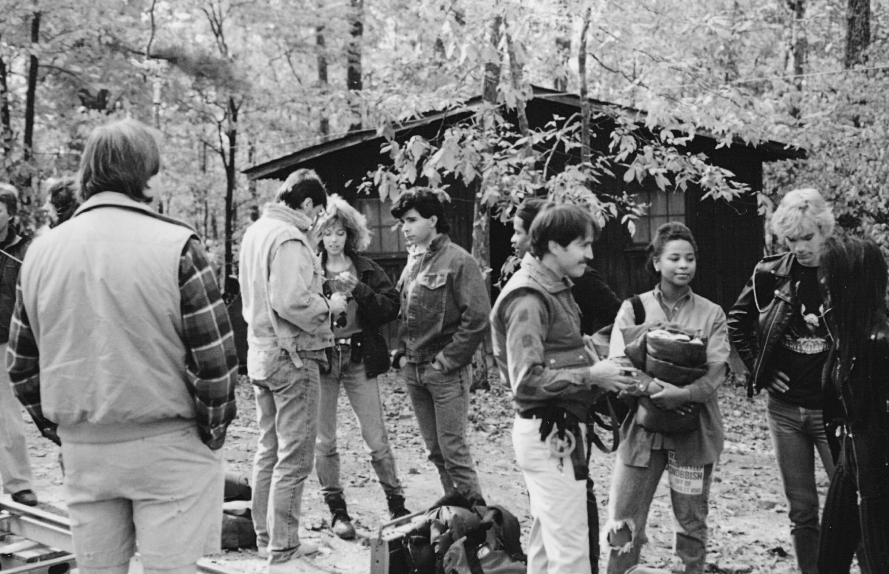 Cast and crew standing outside a cabin on the Sleepaway Camp III set