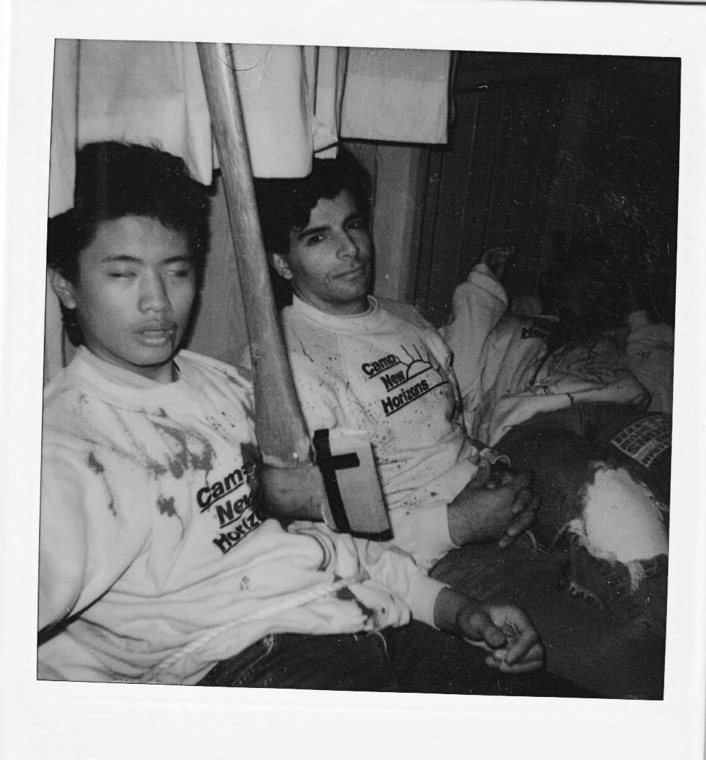 Two campers posing with a hatchet prop on the Sleepaway Camp III set