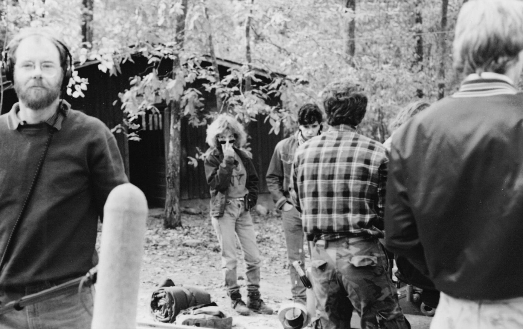 Cast and crew gathered near a cabin on the Sleepaway Camp III set